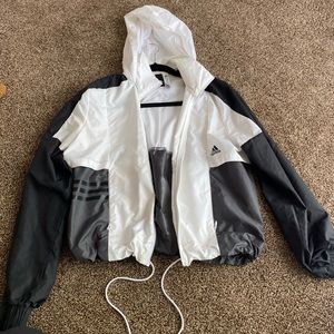 White and black windbreaker